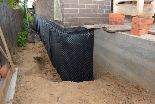 Happy homeowners after waterproofing job in Botkins